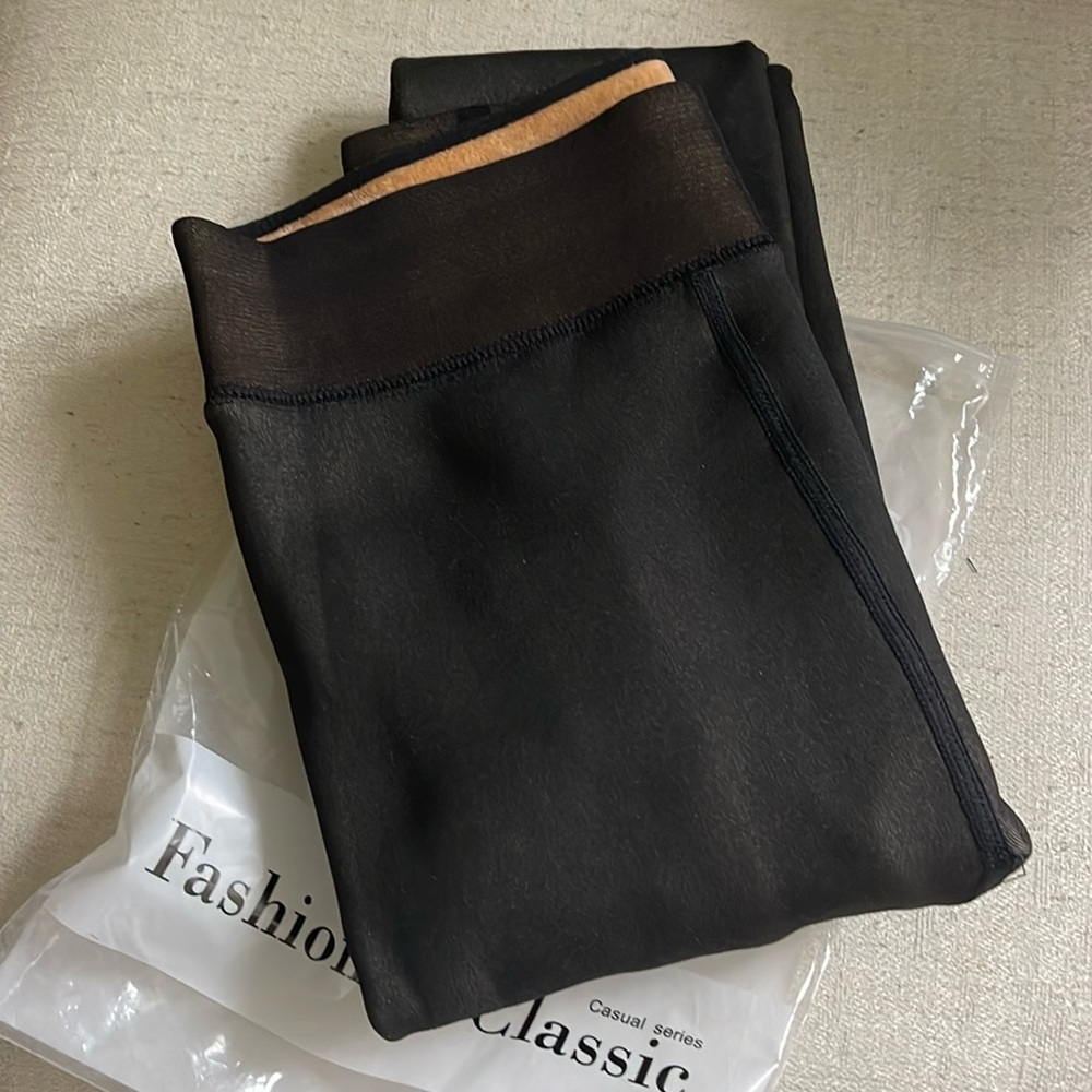 Women’s footed fleece lined tights. Black, Brand new never worn